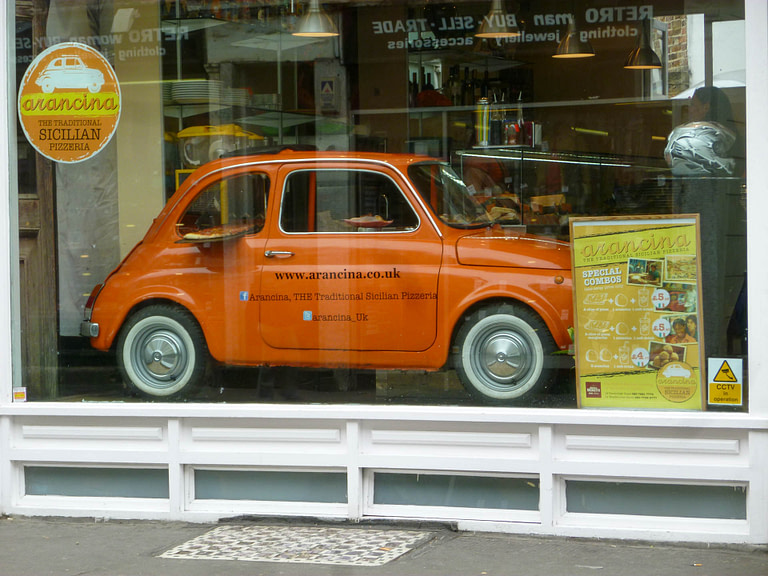 orange car in window