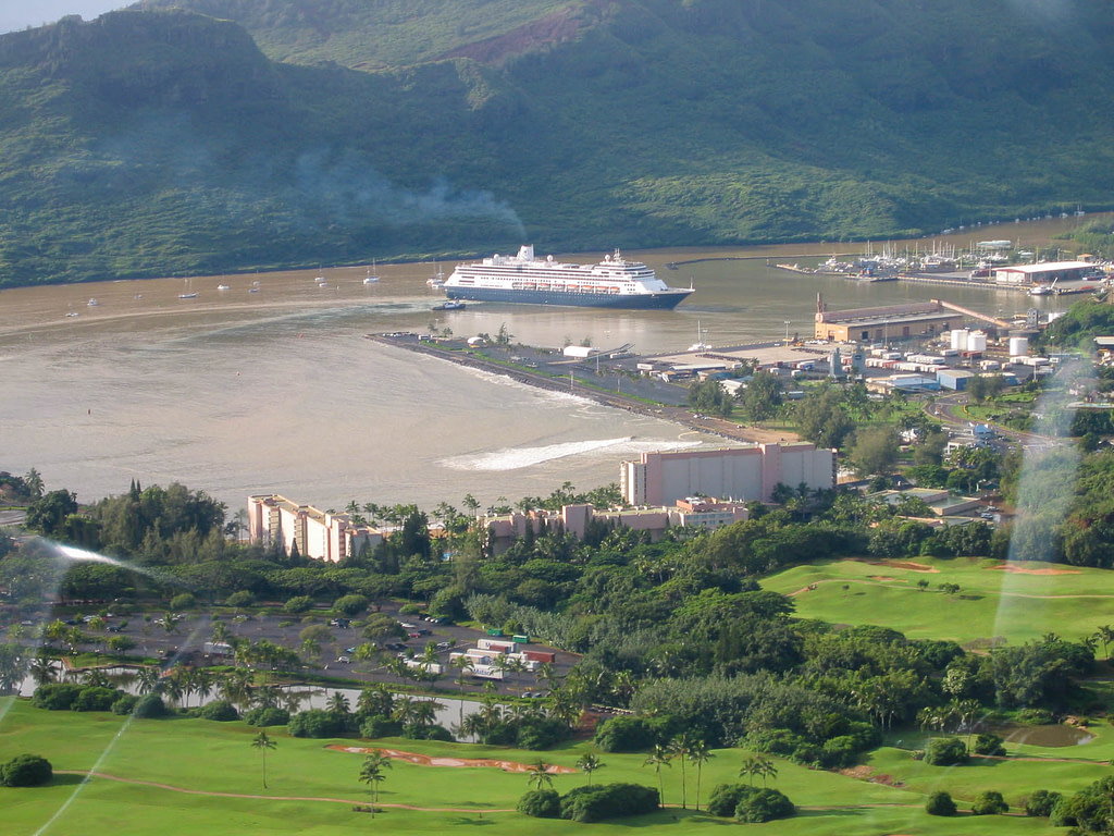 cruise ship in muddy river