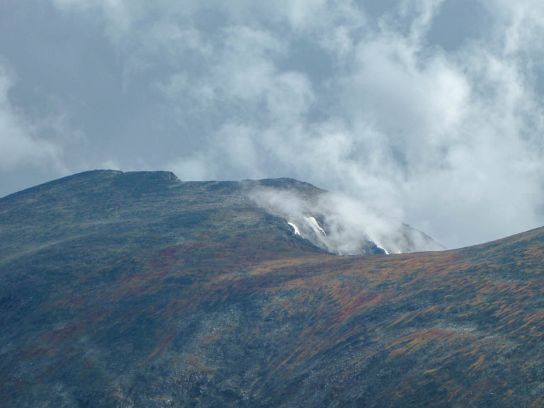 mountain top with clouds