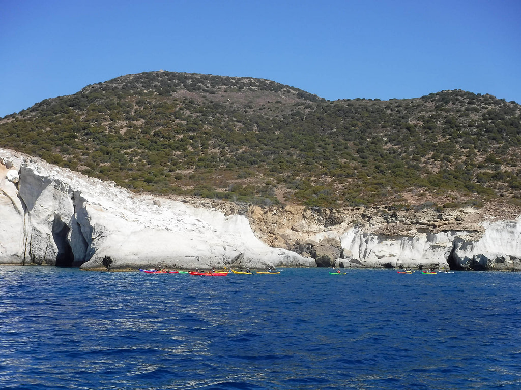 shoreline with kayaks