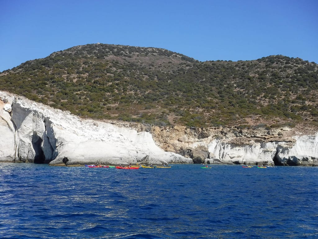 shoreline with kayaks