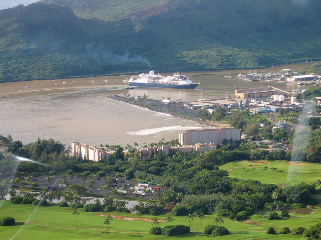 cruise ship in muddy river