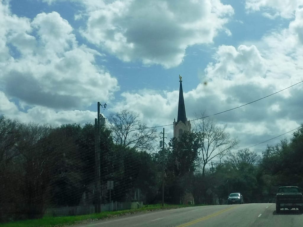 steeple with gold finger
