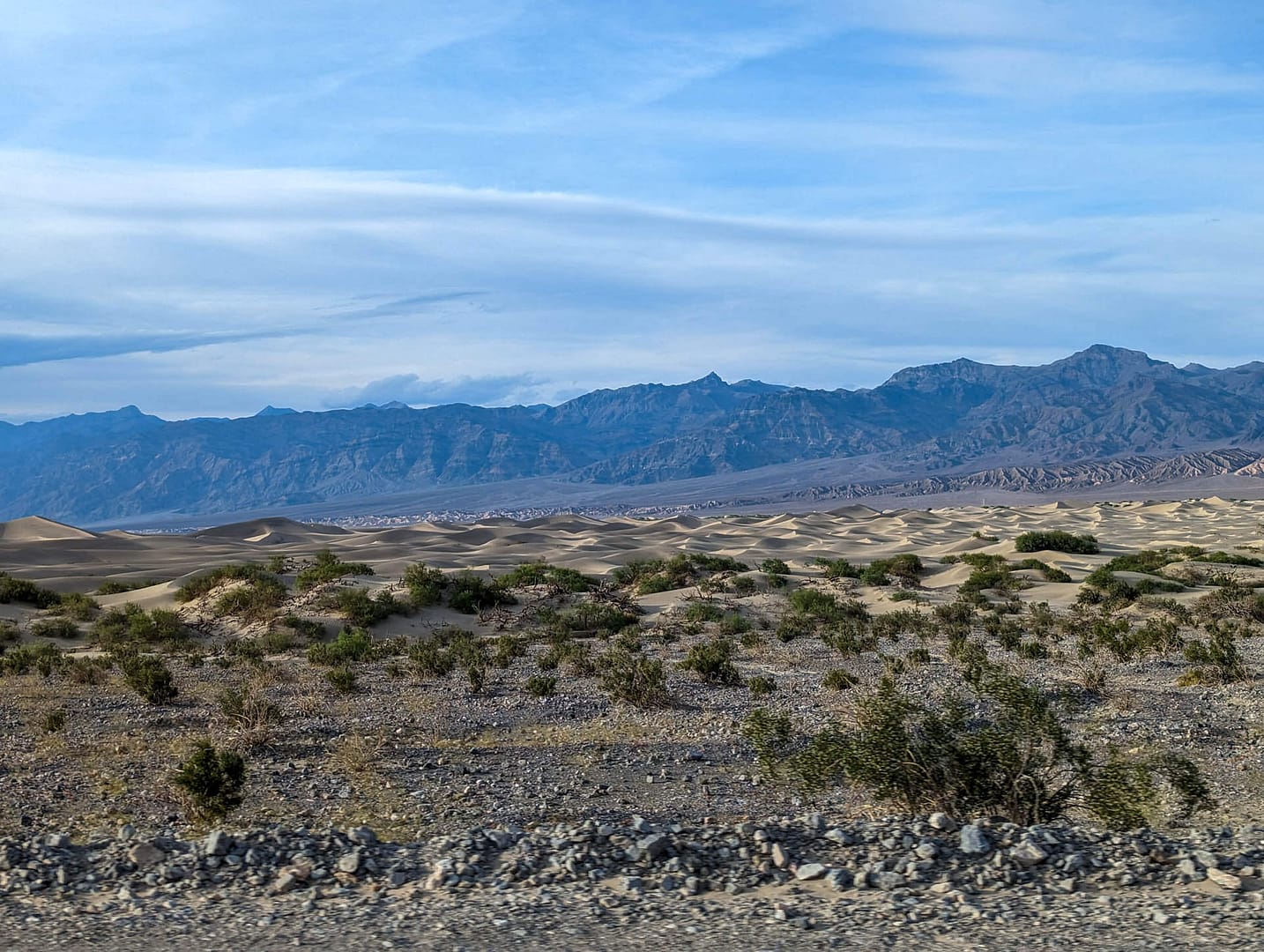 dunes with mountains in background