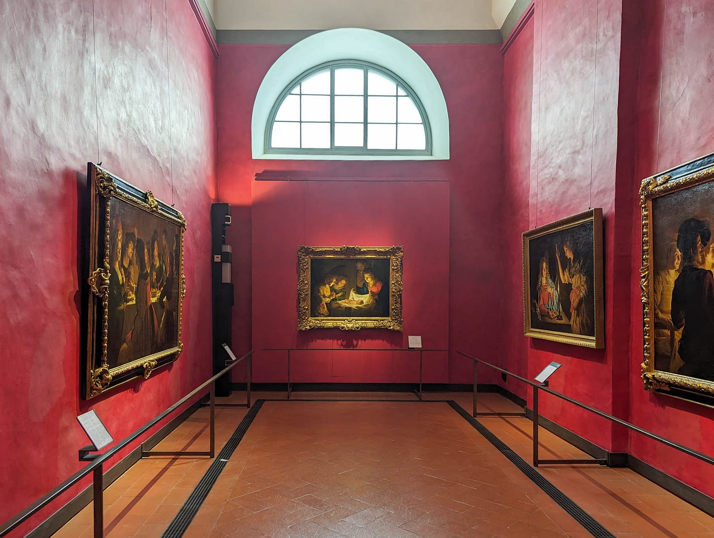 red walls with paintings