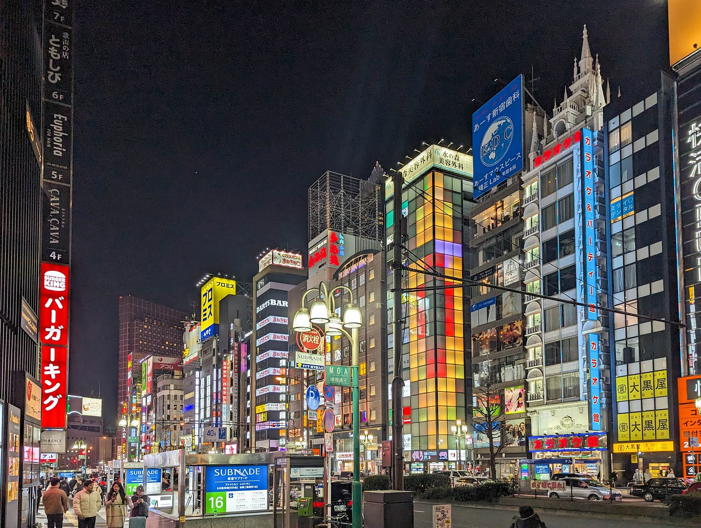 brightly lit skyscrapers