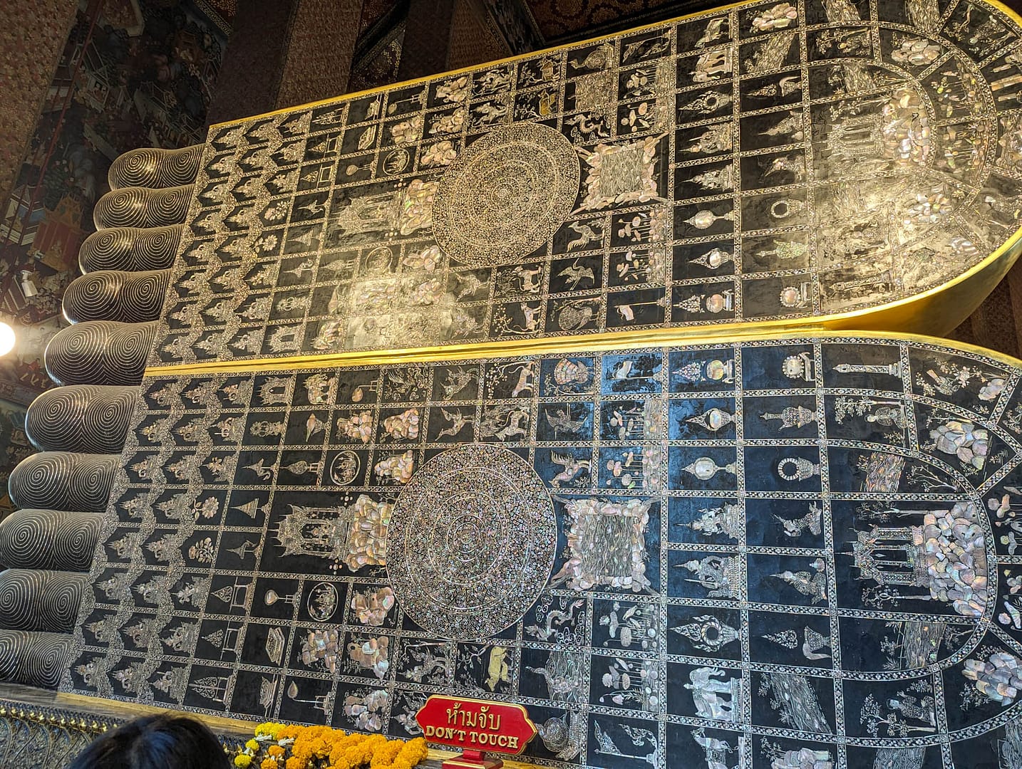 reclining buddha feet soles
