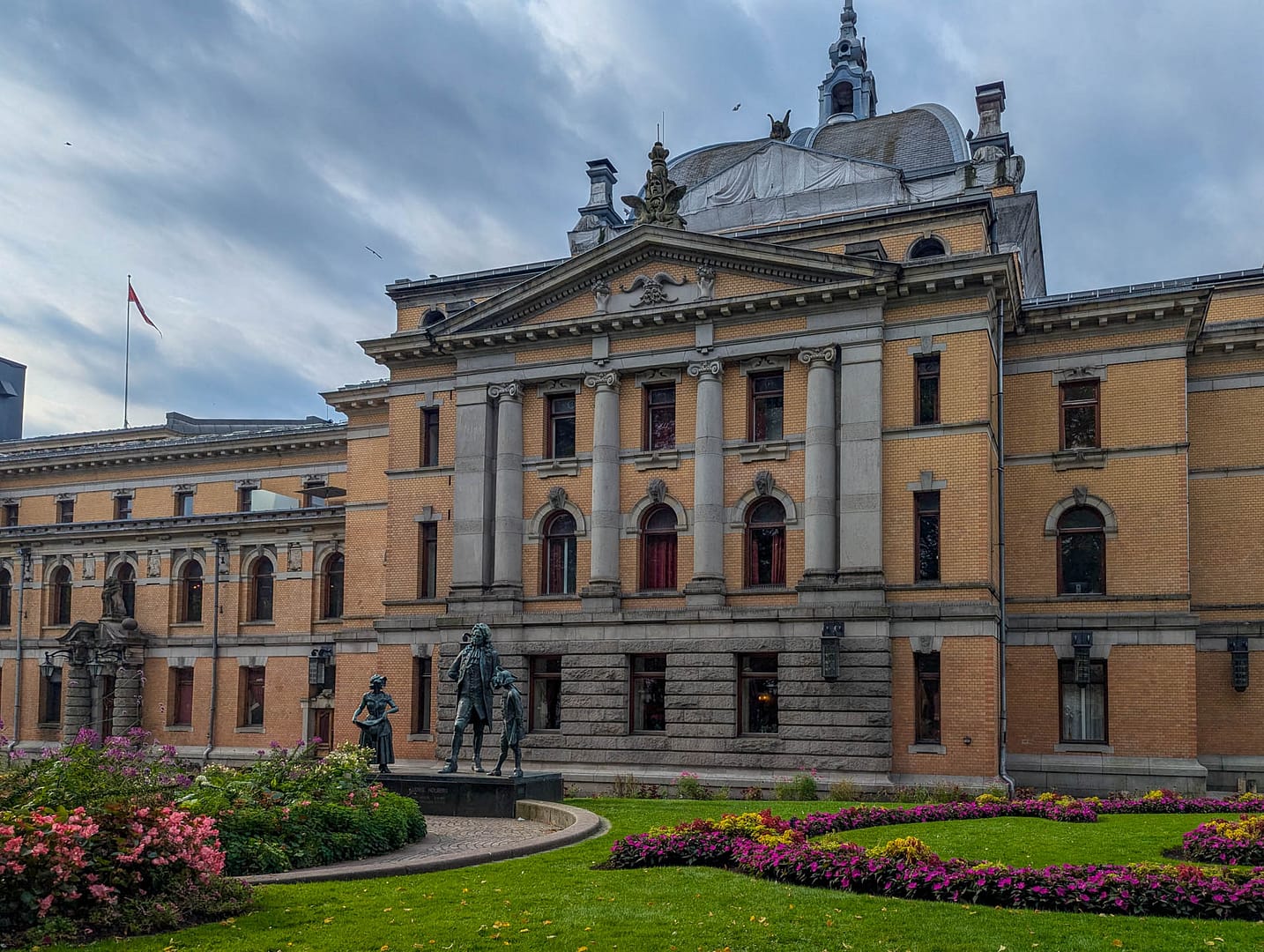 statue and old building