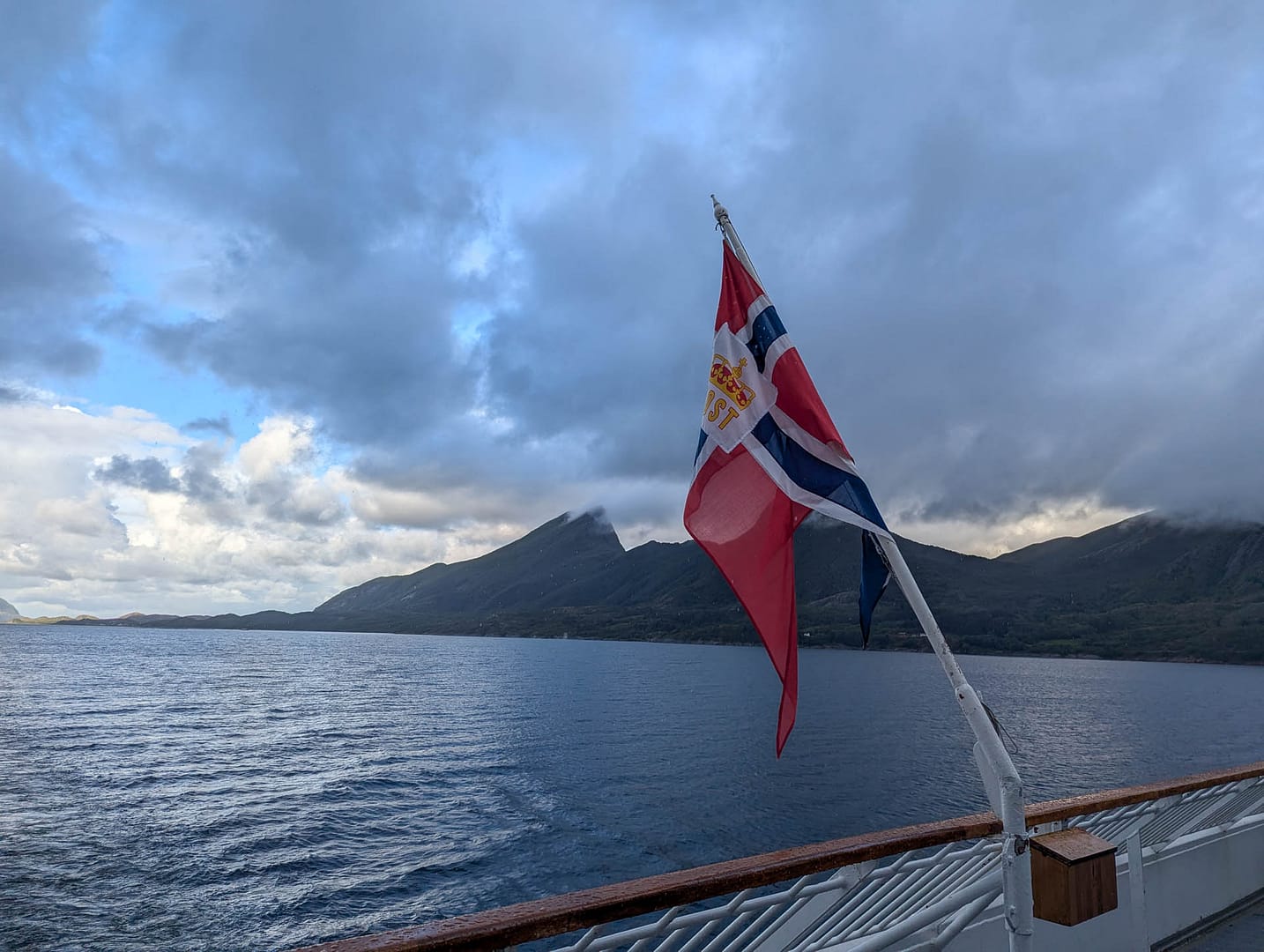 Norwegian flag and fjord
