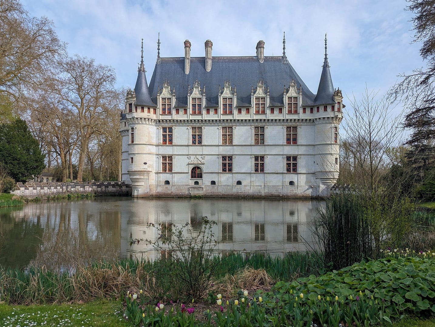 chateau reflected in water
