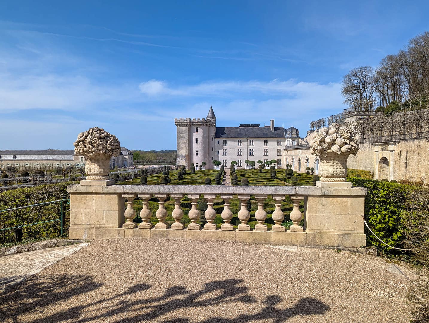 chateau with urns in foreground