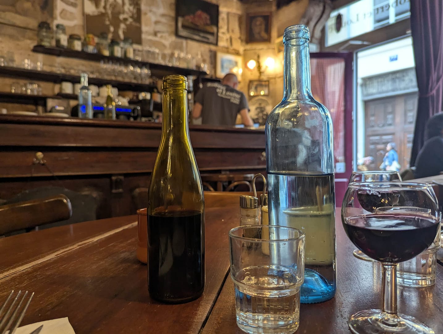 bottles and glasses on table