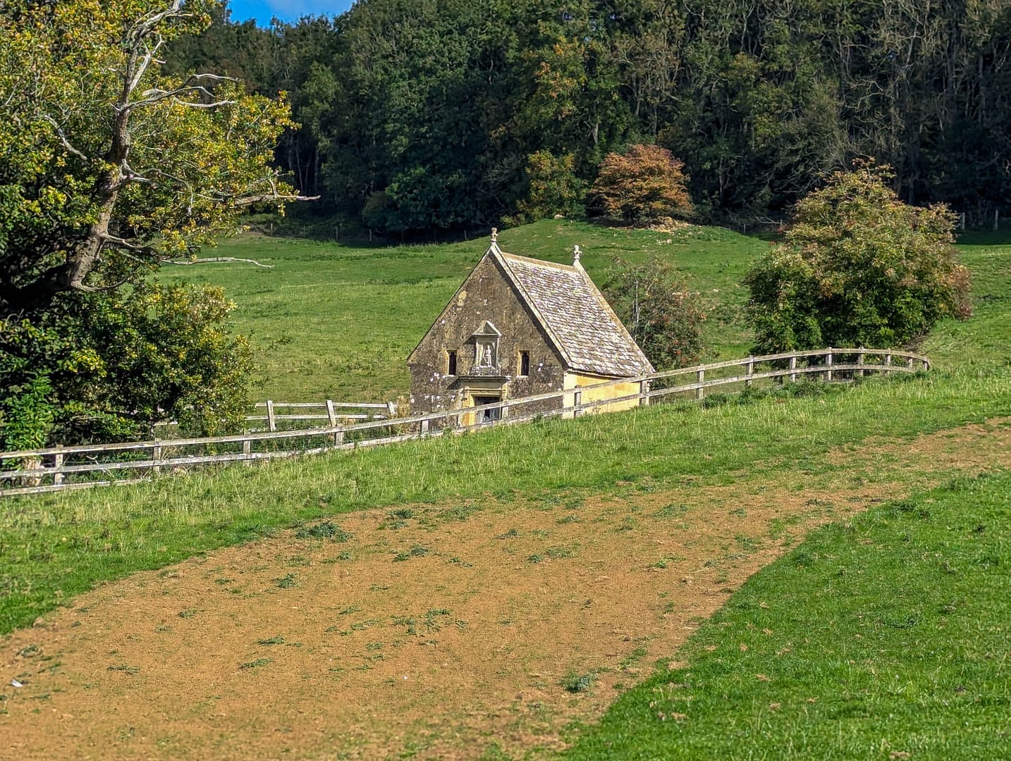 well with small building