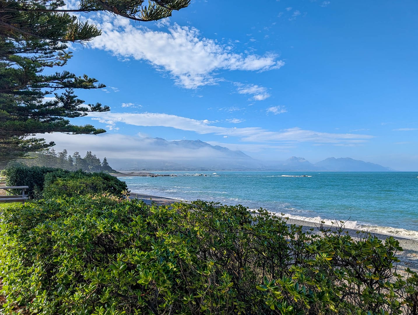 beach with mountains in distance