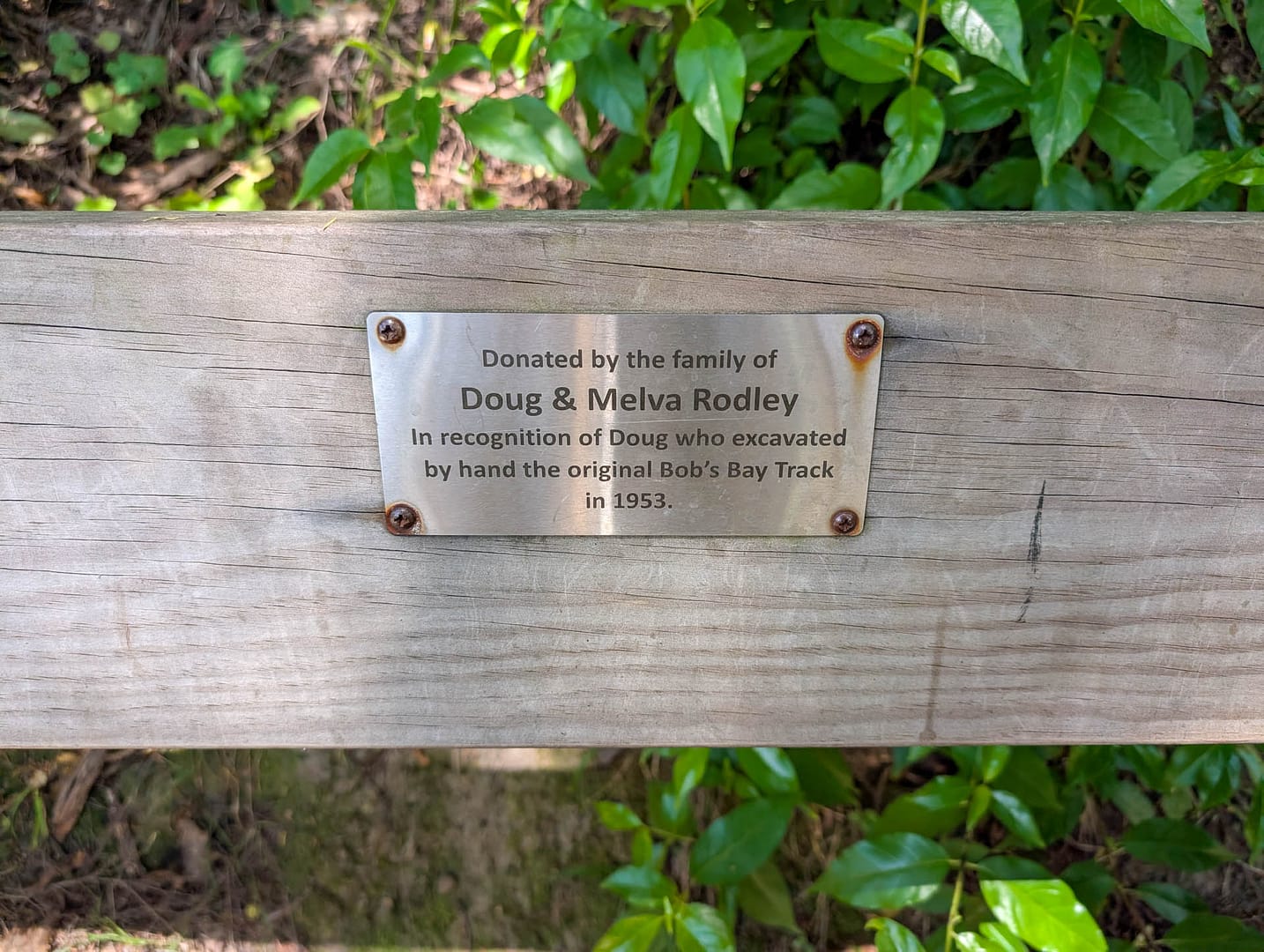 memorial plaque for person who dug the track