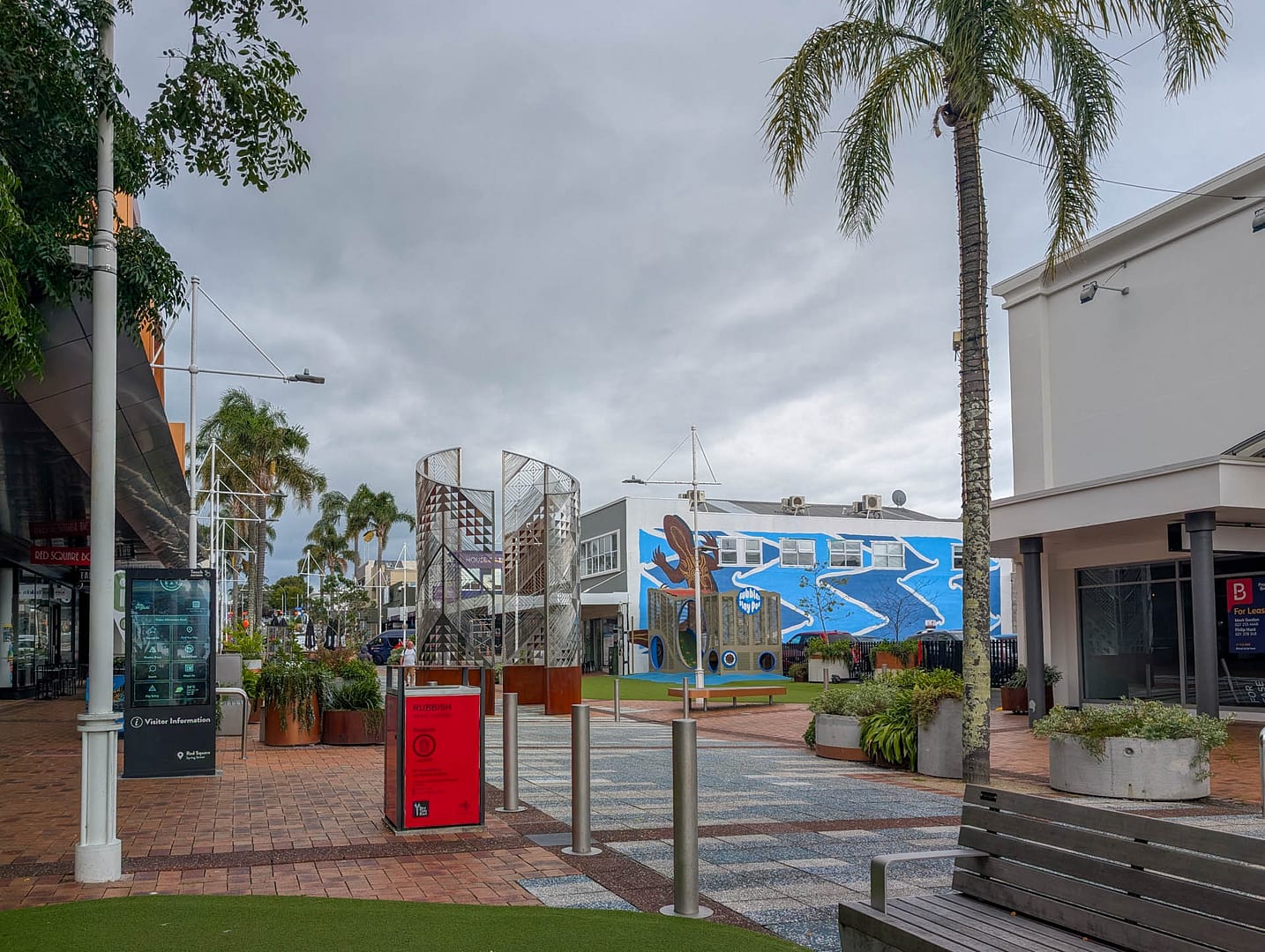 modern buildings and palm trees