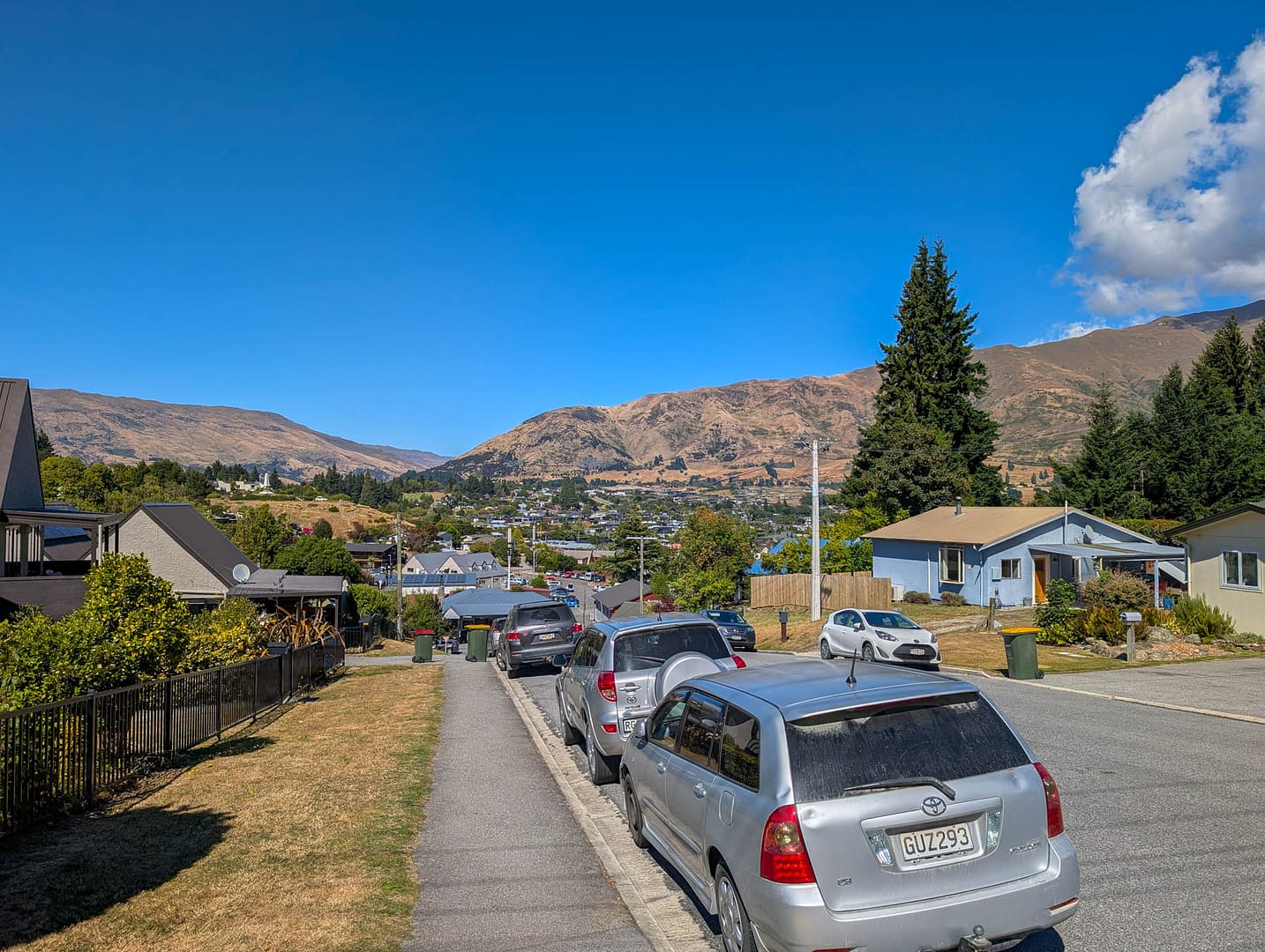 steep road with cars parked
