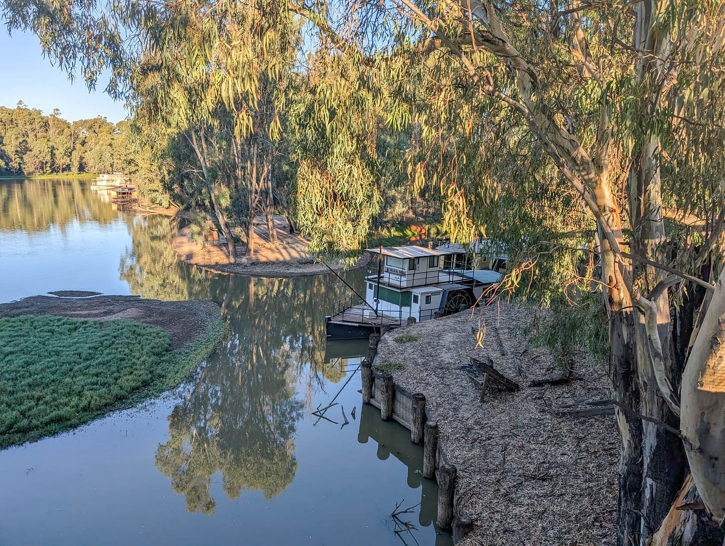 paddlewheeler in river cove