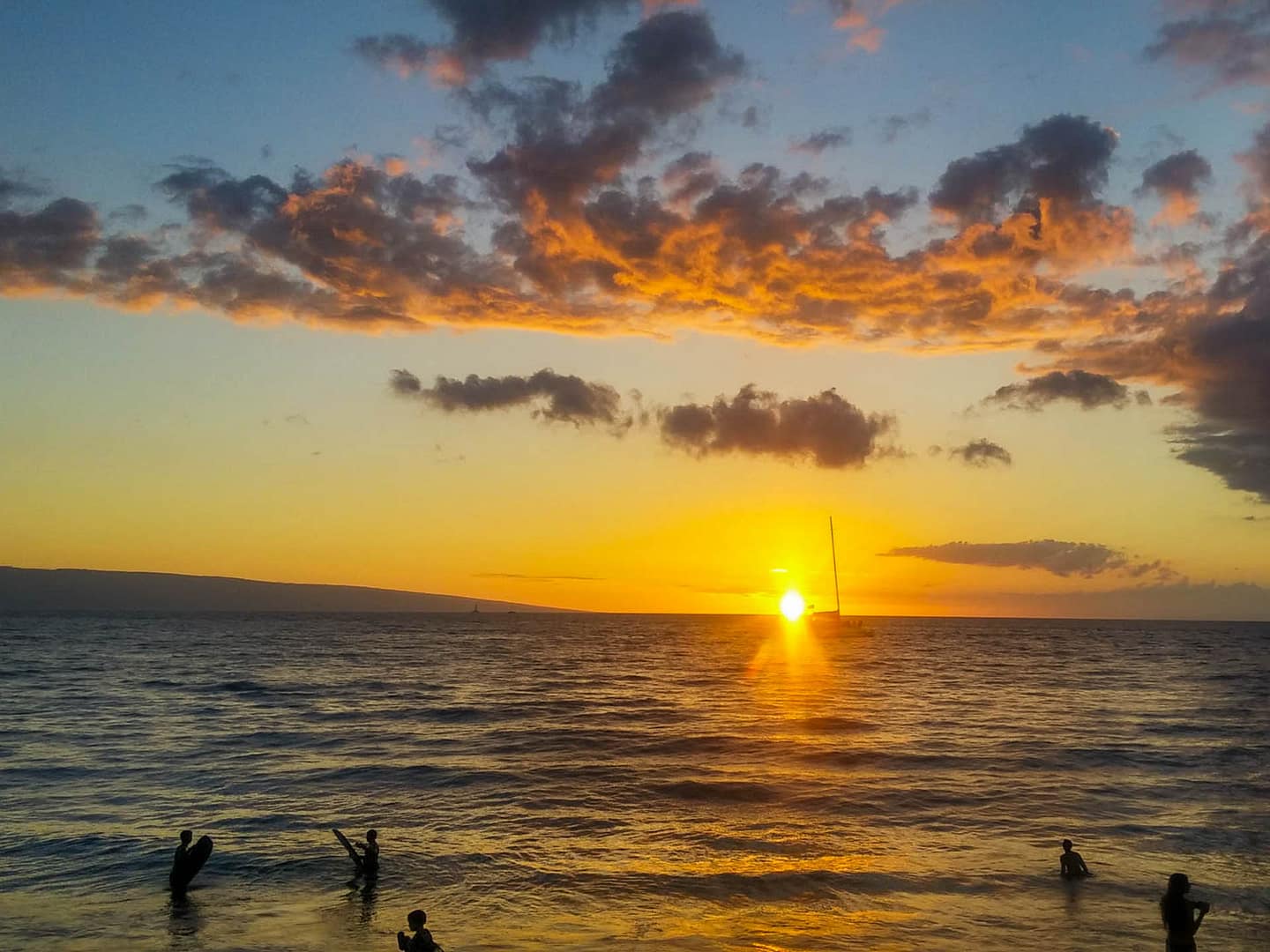 sunset with surfers
