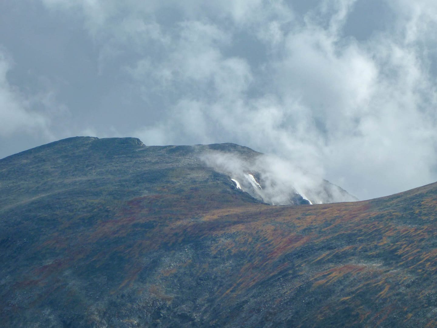 mountain top with clouds