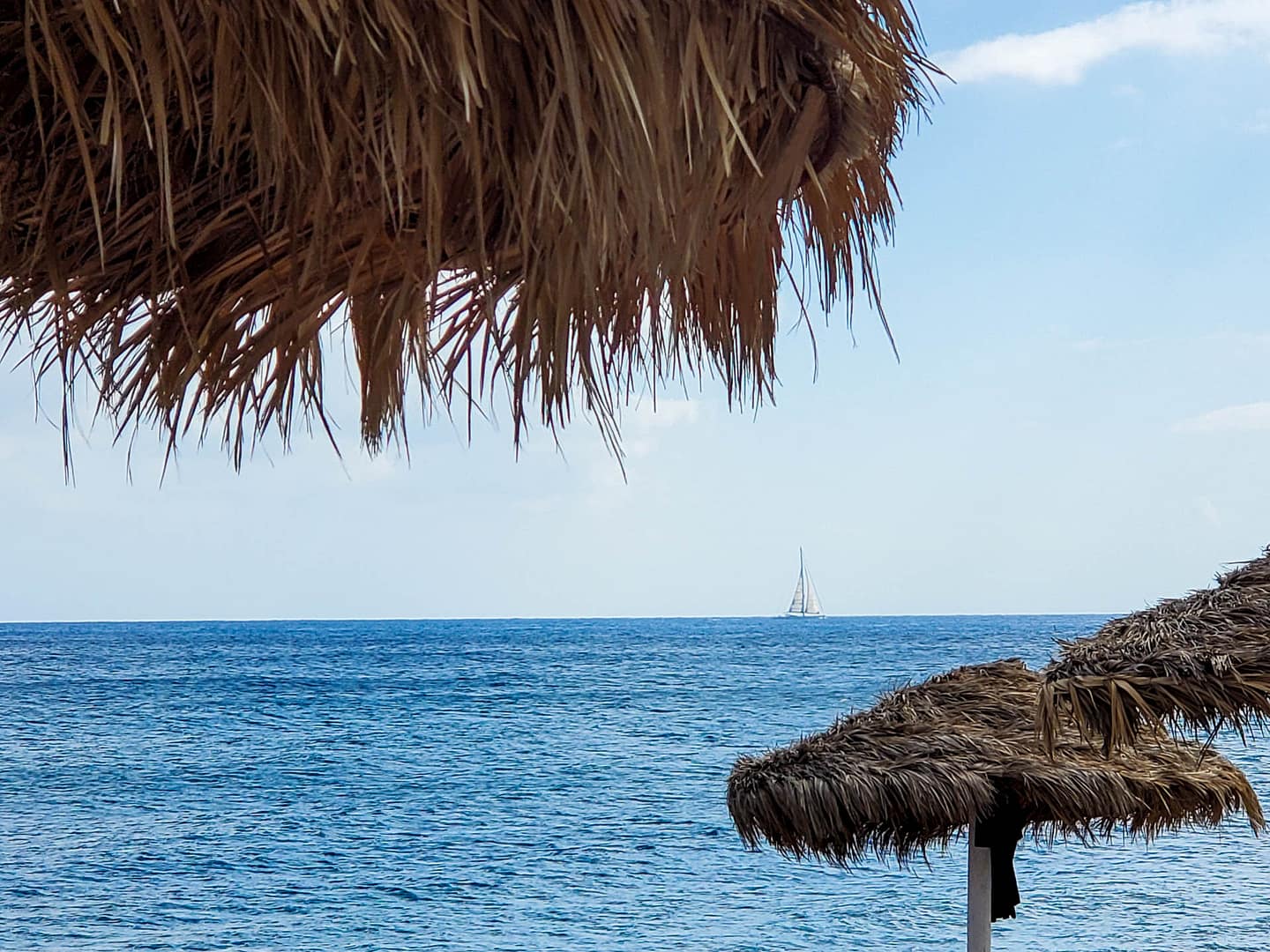 palapas and the sea