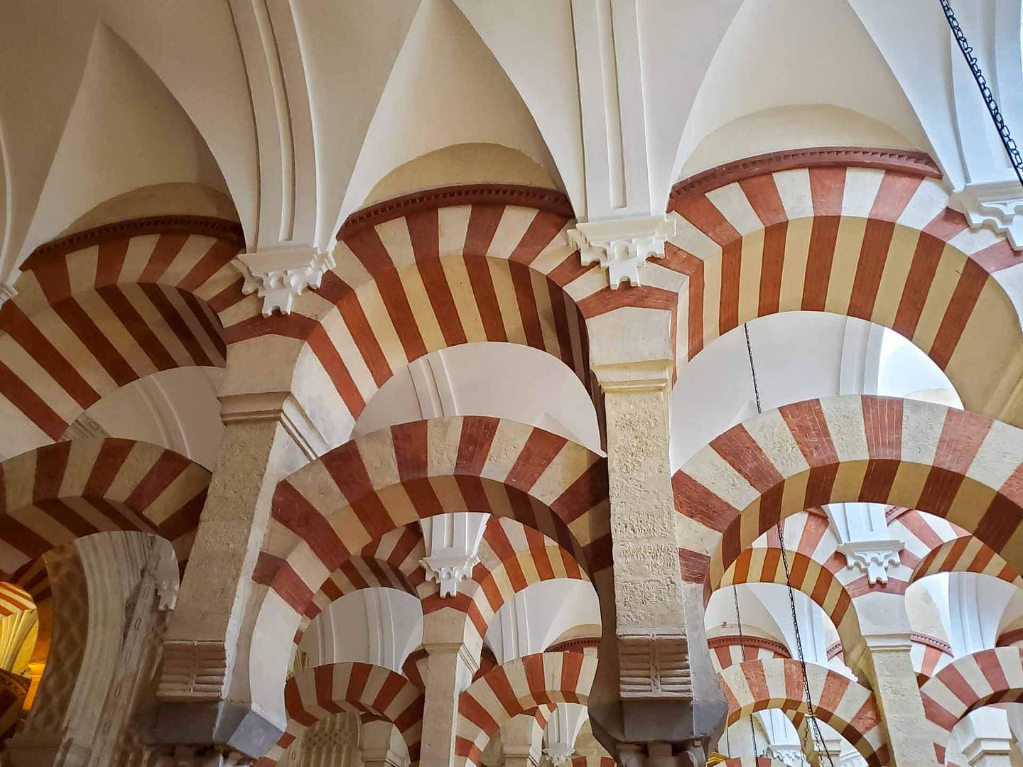red and white striped arches
