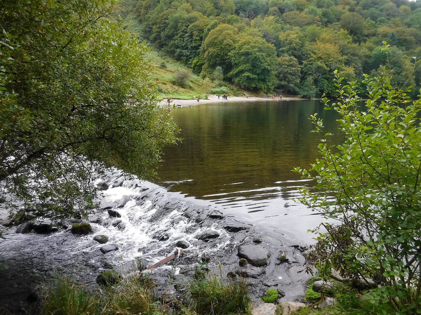 weir and beach in background