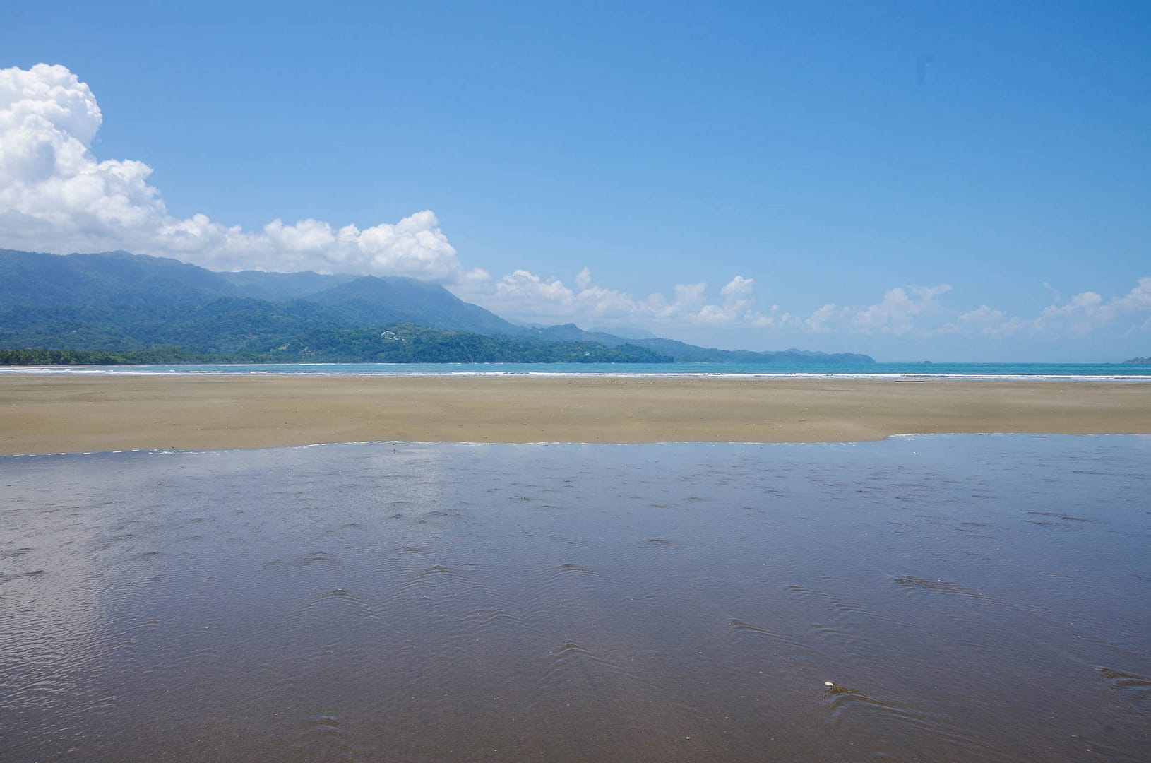 Note the waves from two directions. Uvita beach