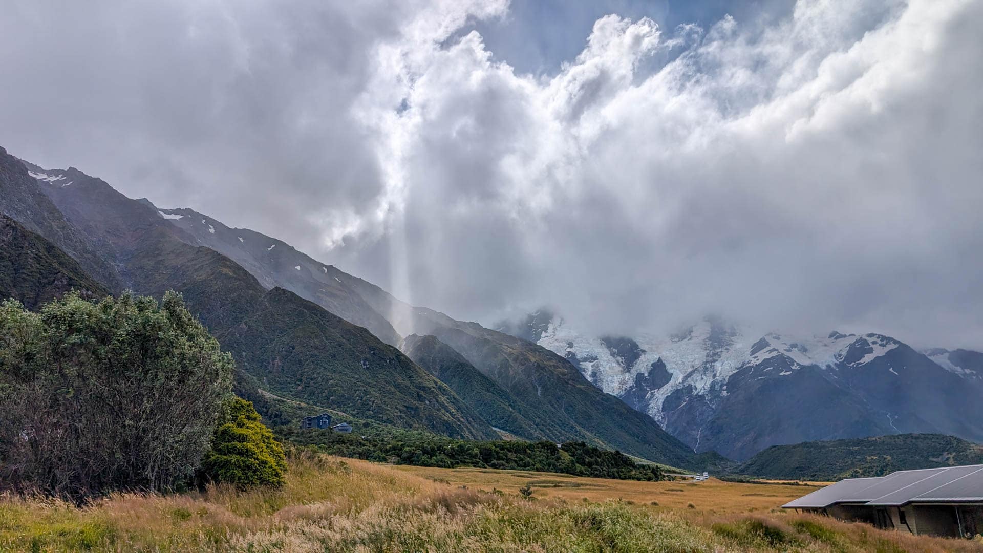 sunbeams breaking through clouds