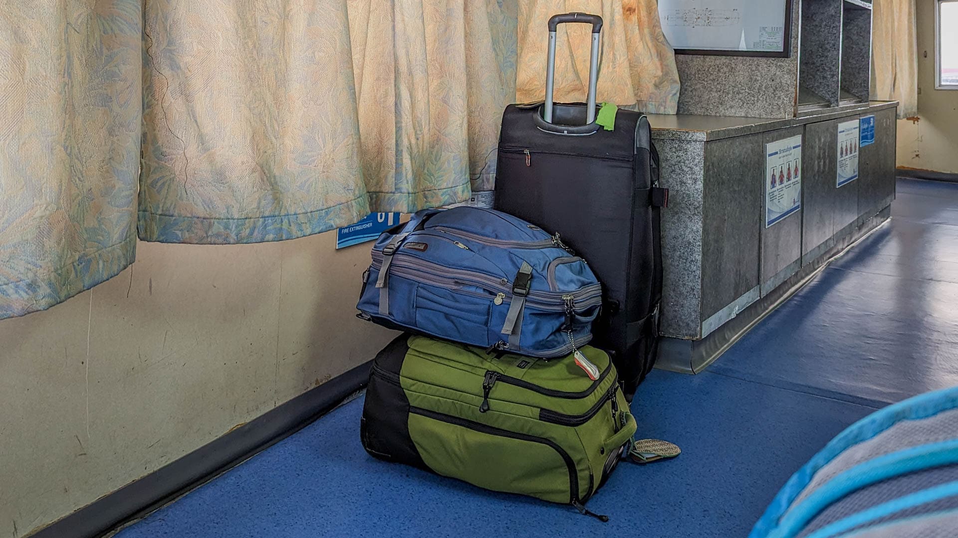 two carryons and a rolling duffel bag