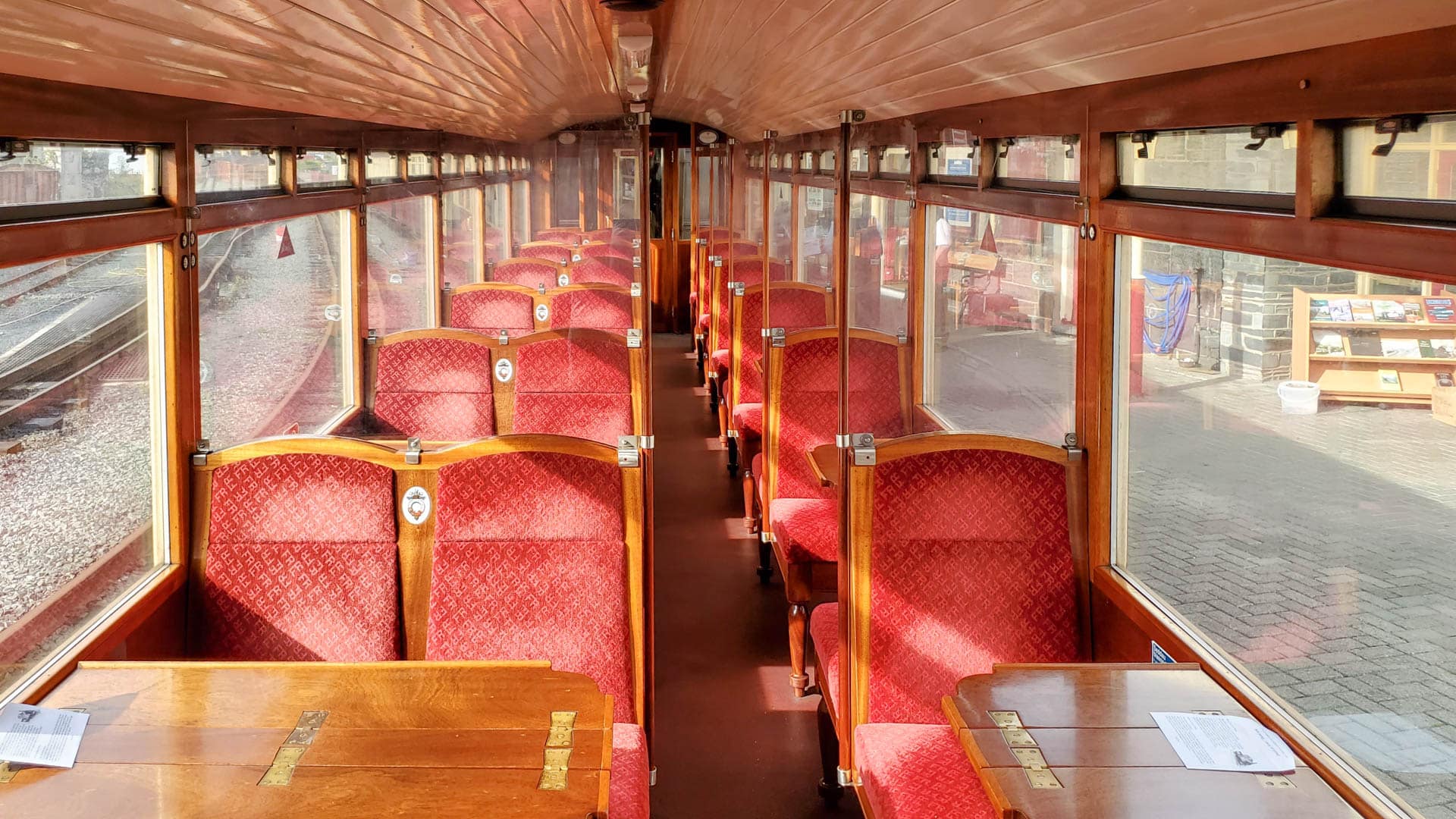 old style train car in red and gold