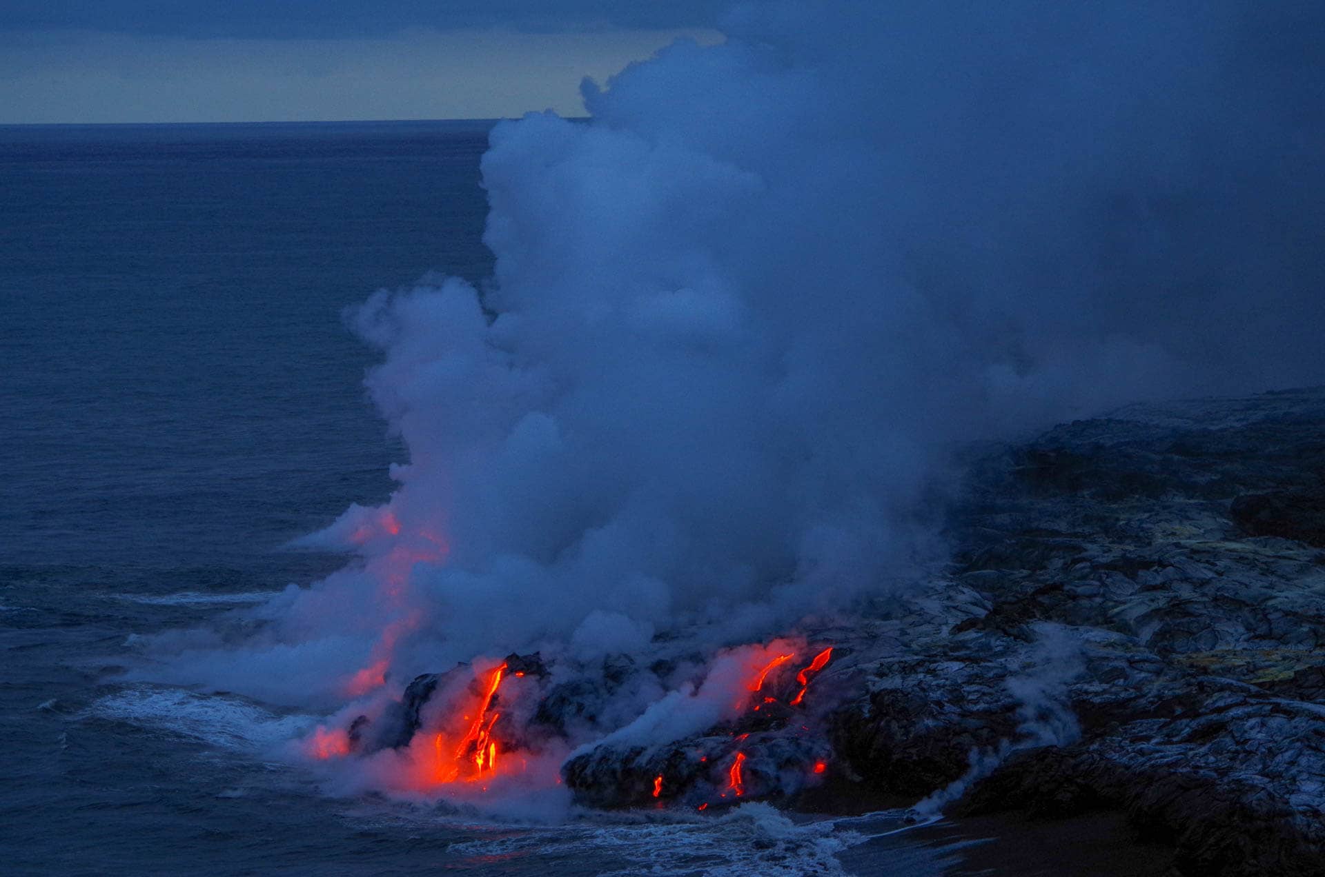 lava flowing into the ocean