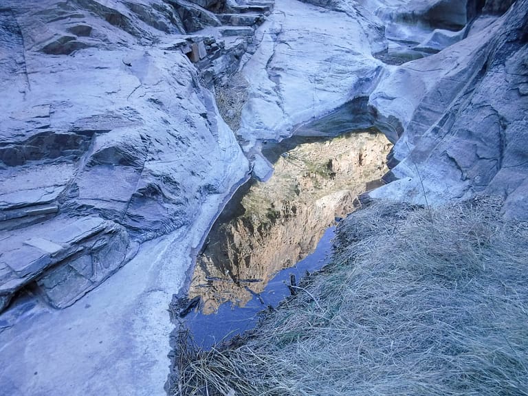 mountains reflected in pool