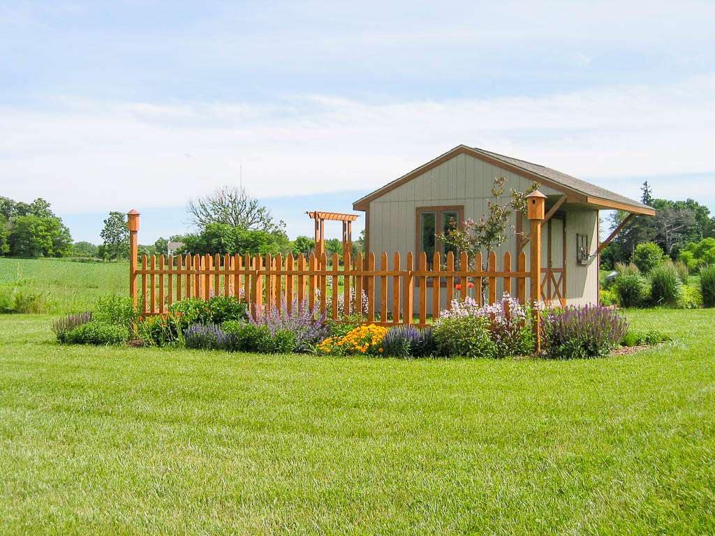 Perennial-03 wood fence and pergola next to shed