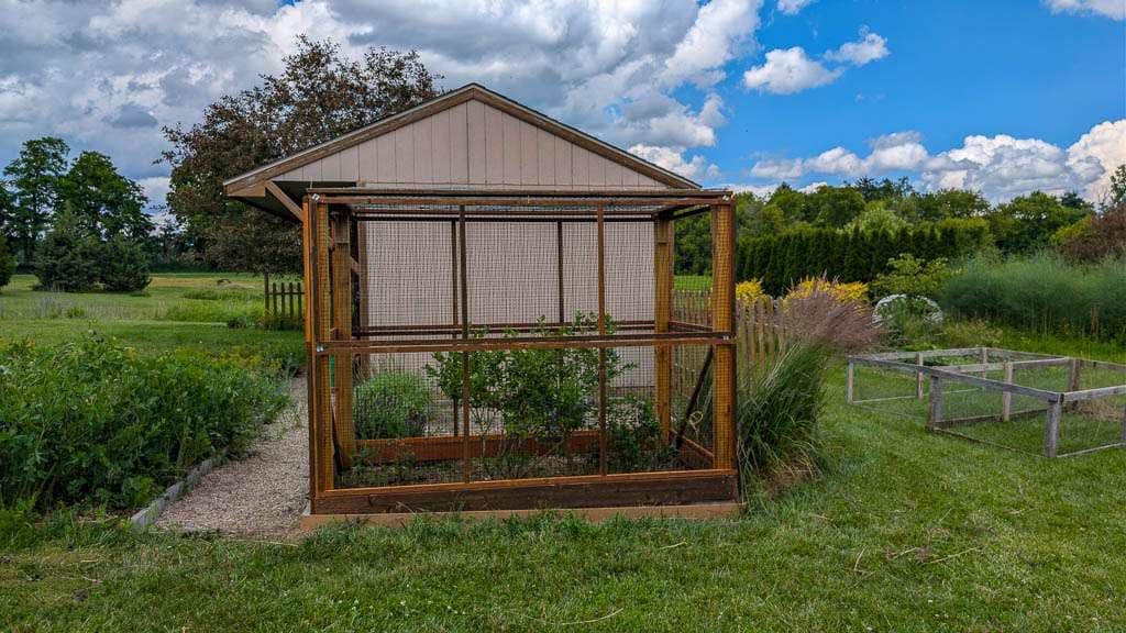 cage of wood and deer netting