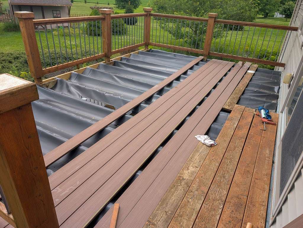 Deck-14 waterproof membrane and new deck boards