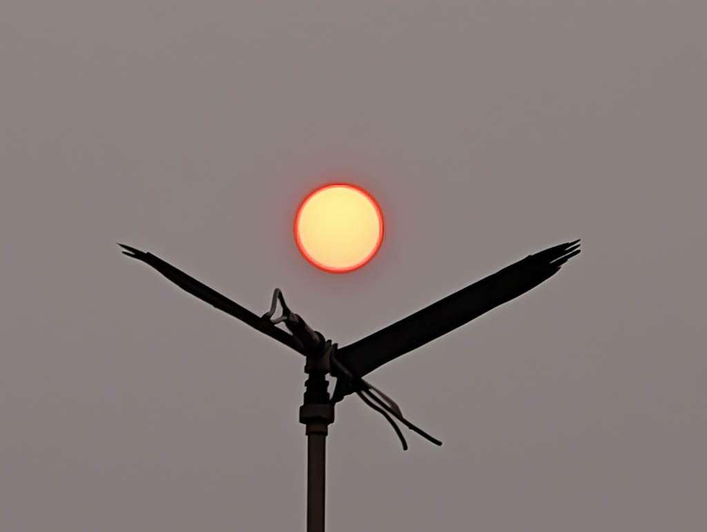 Deck-18 sun glowing through wildfire smoke