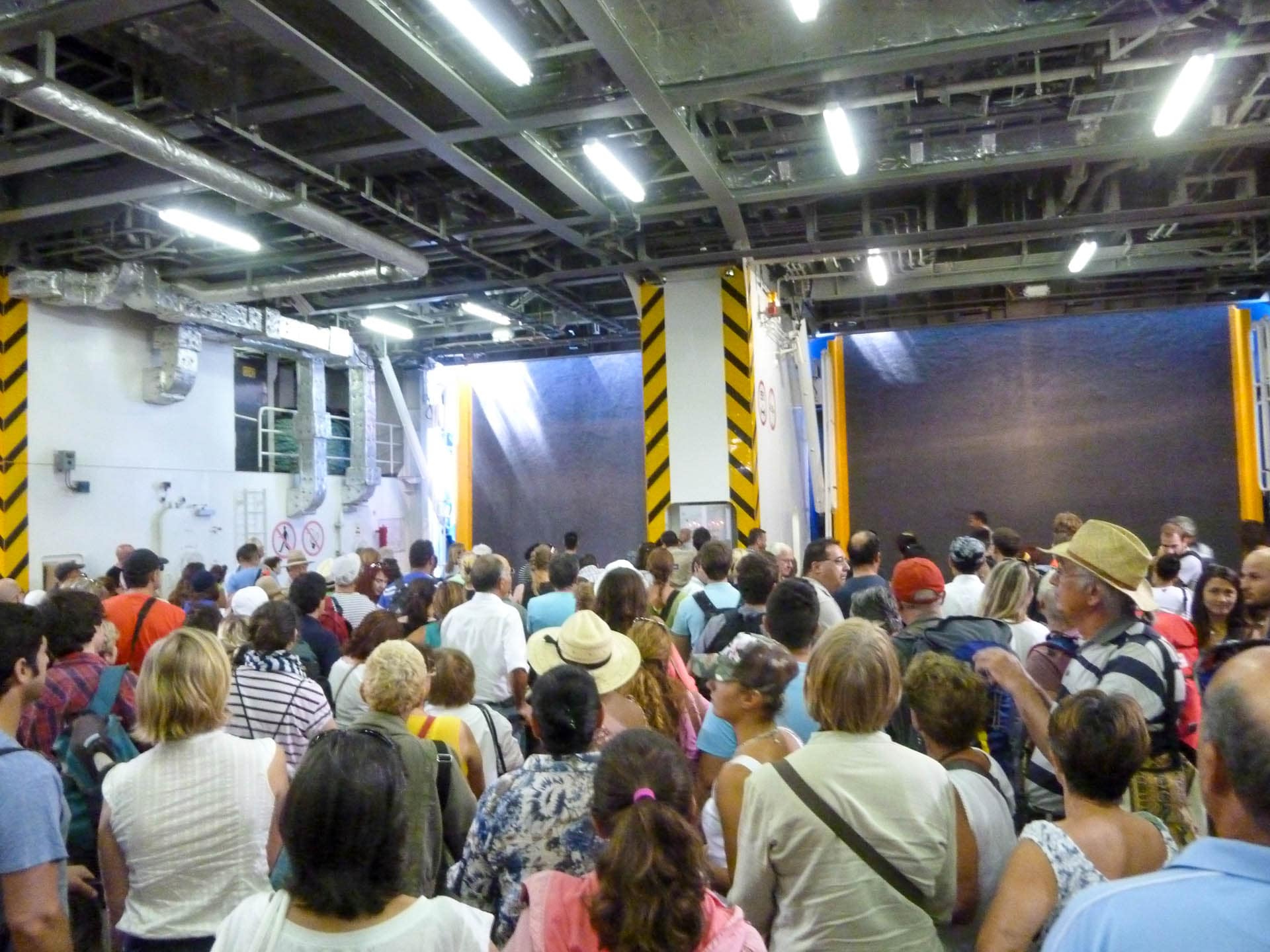 crowd waiting to leave ferry