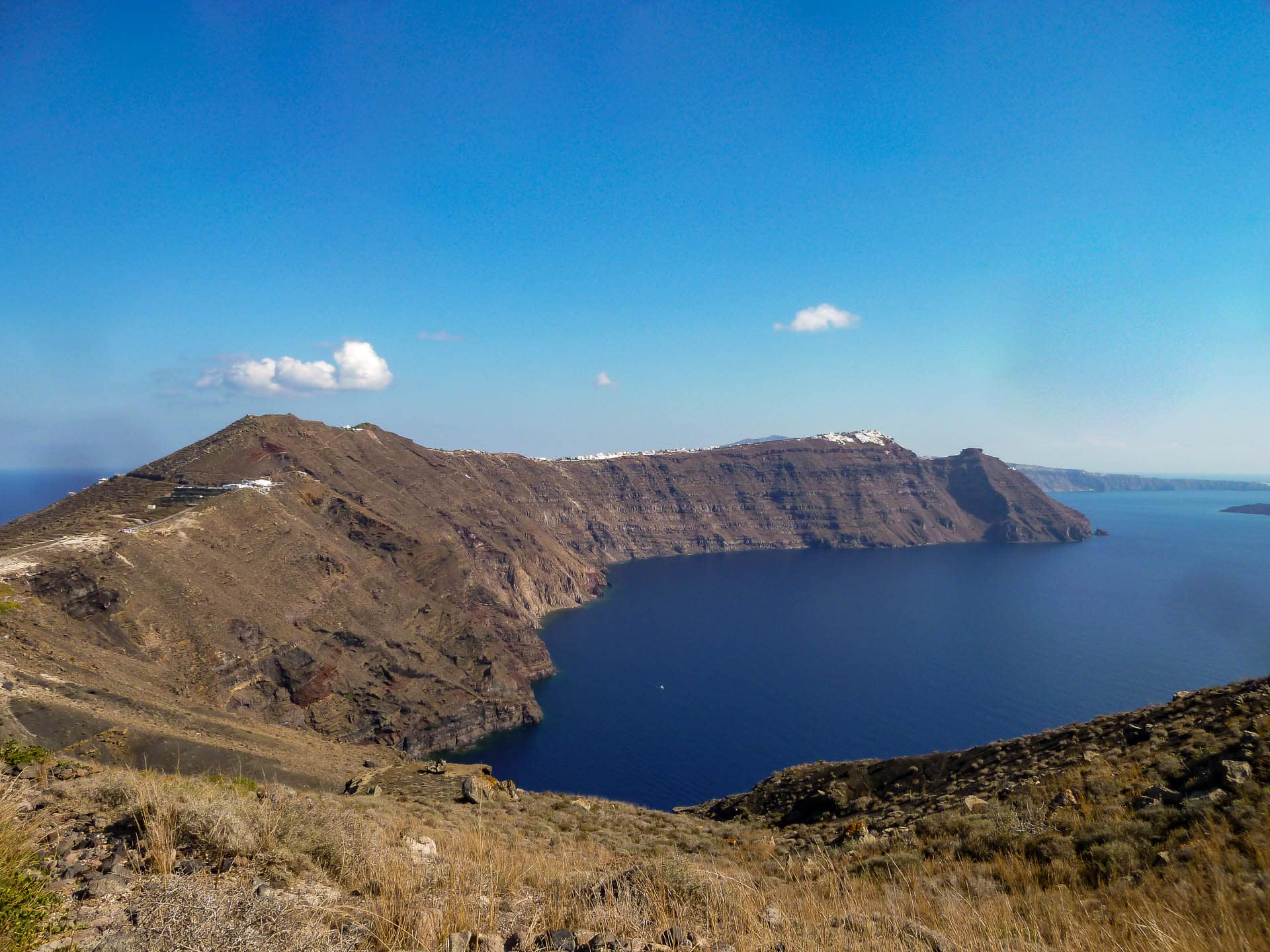 island with blue sky and water