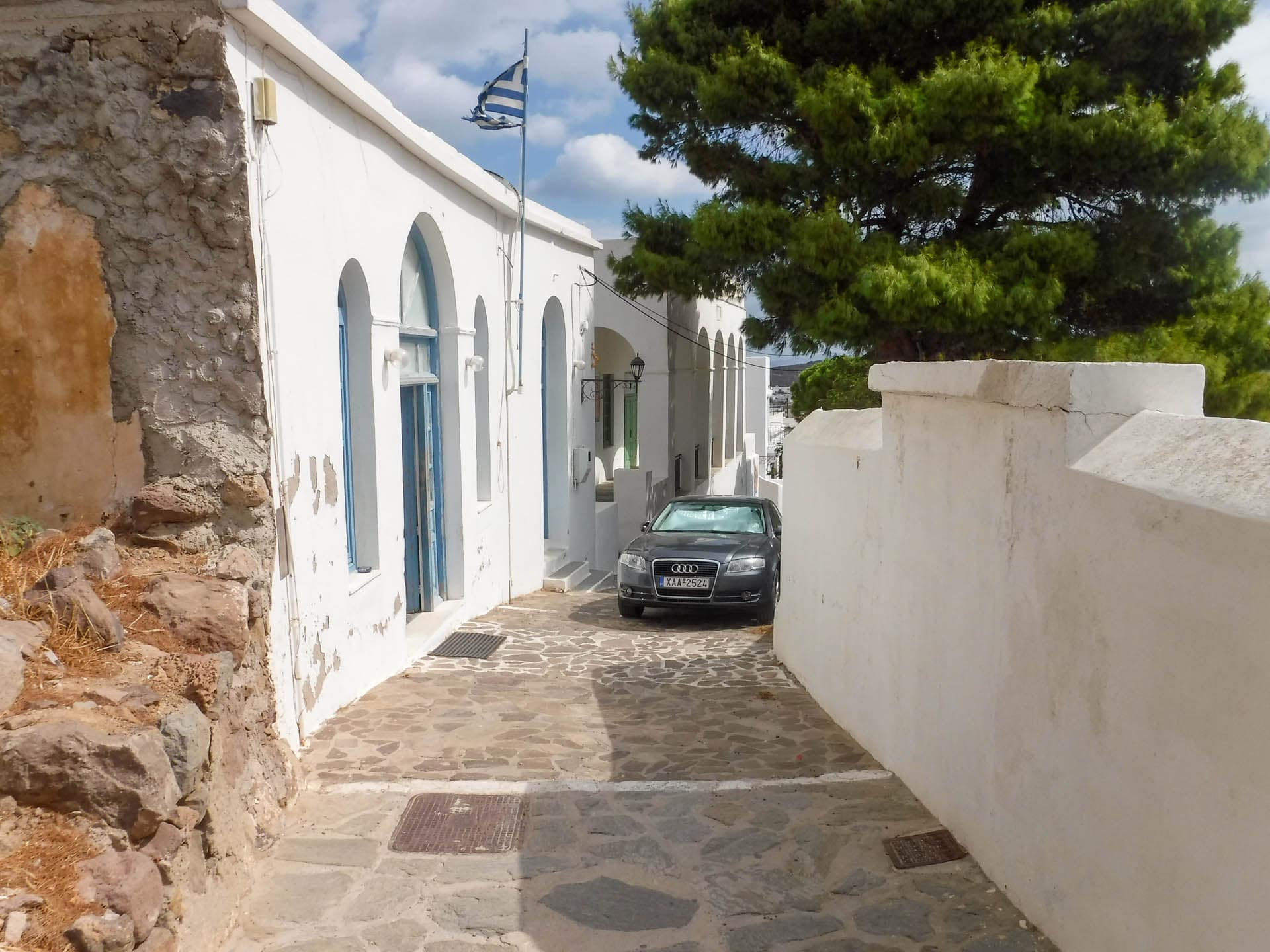 narrow street with car