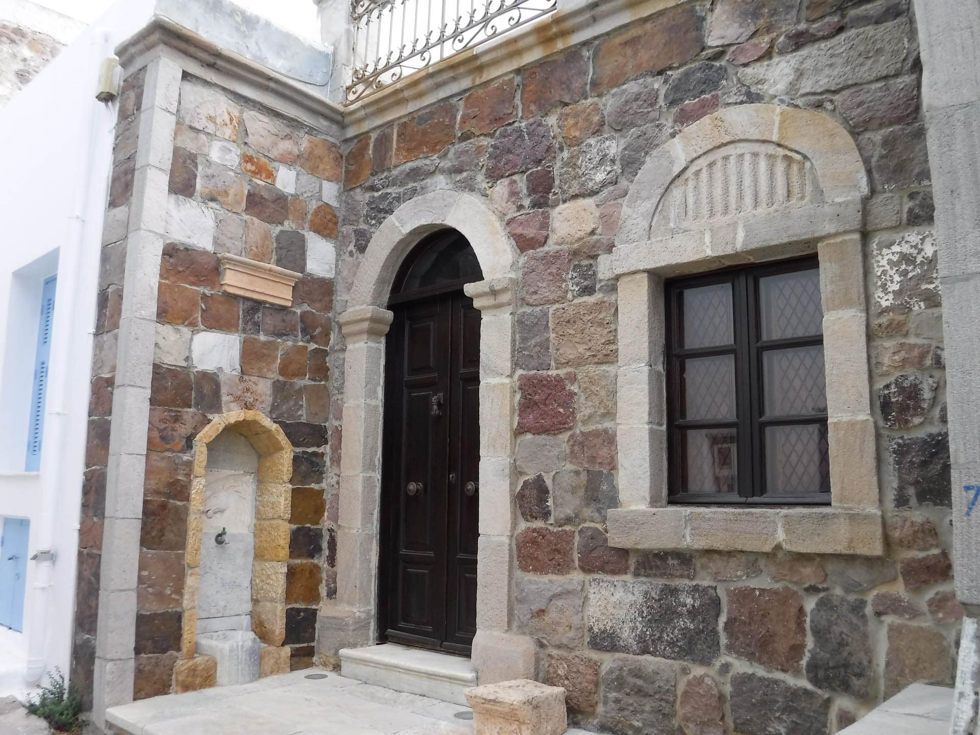 stone cottage with outside water source