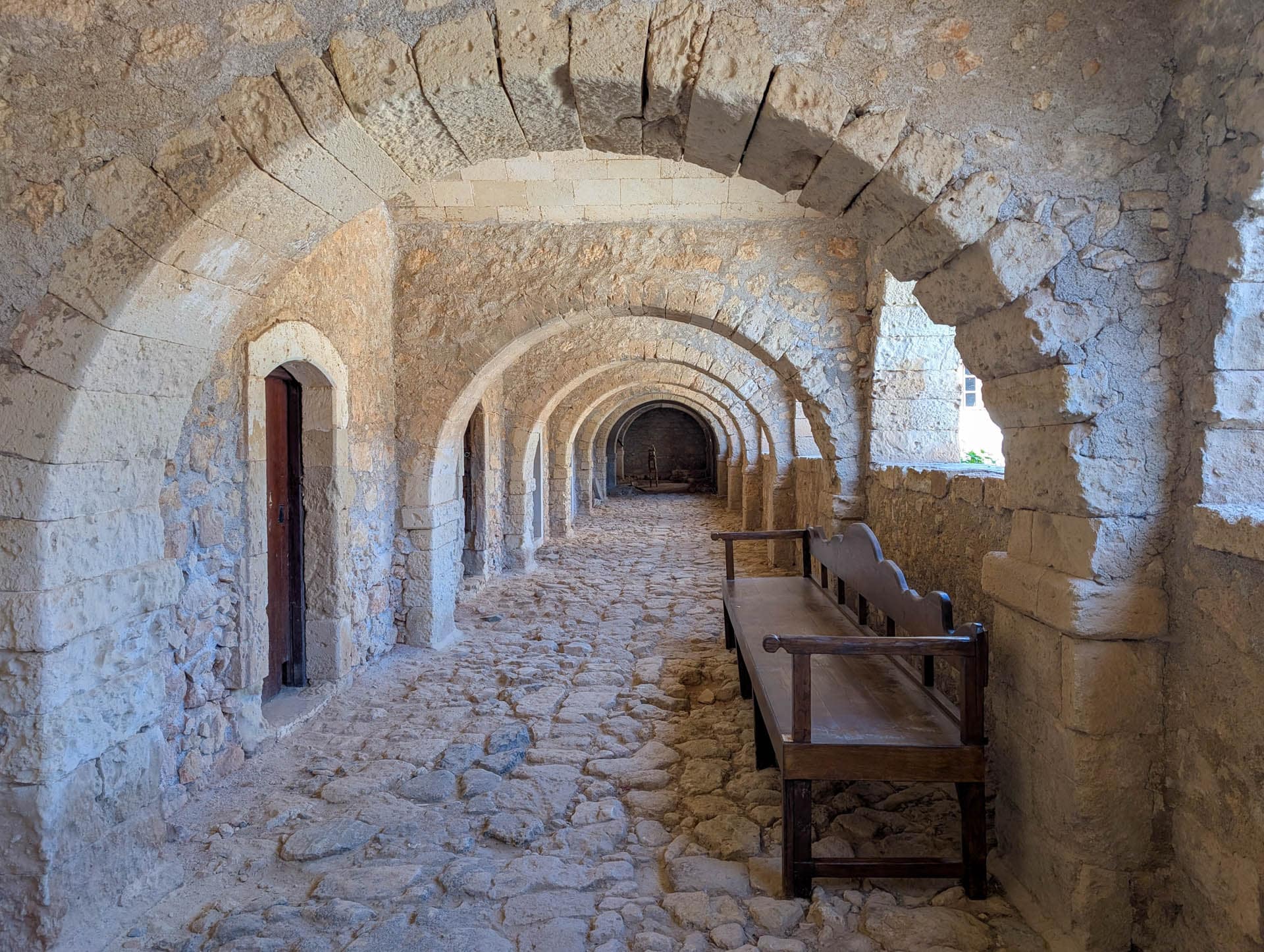 cloister with rough cobble floor