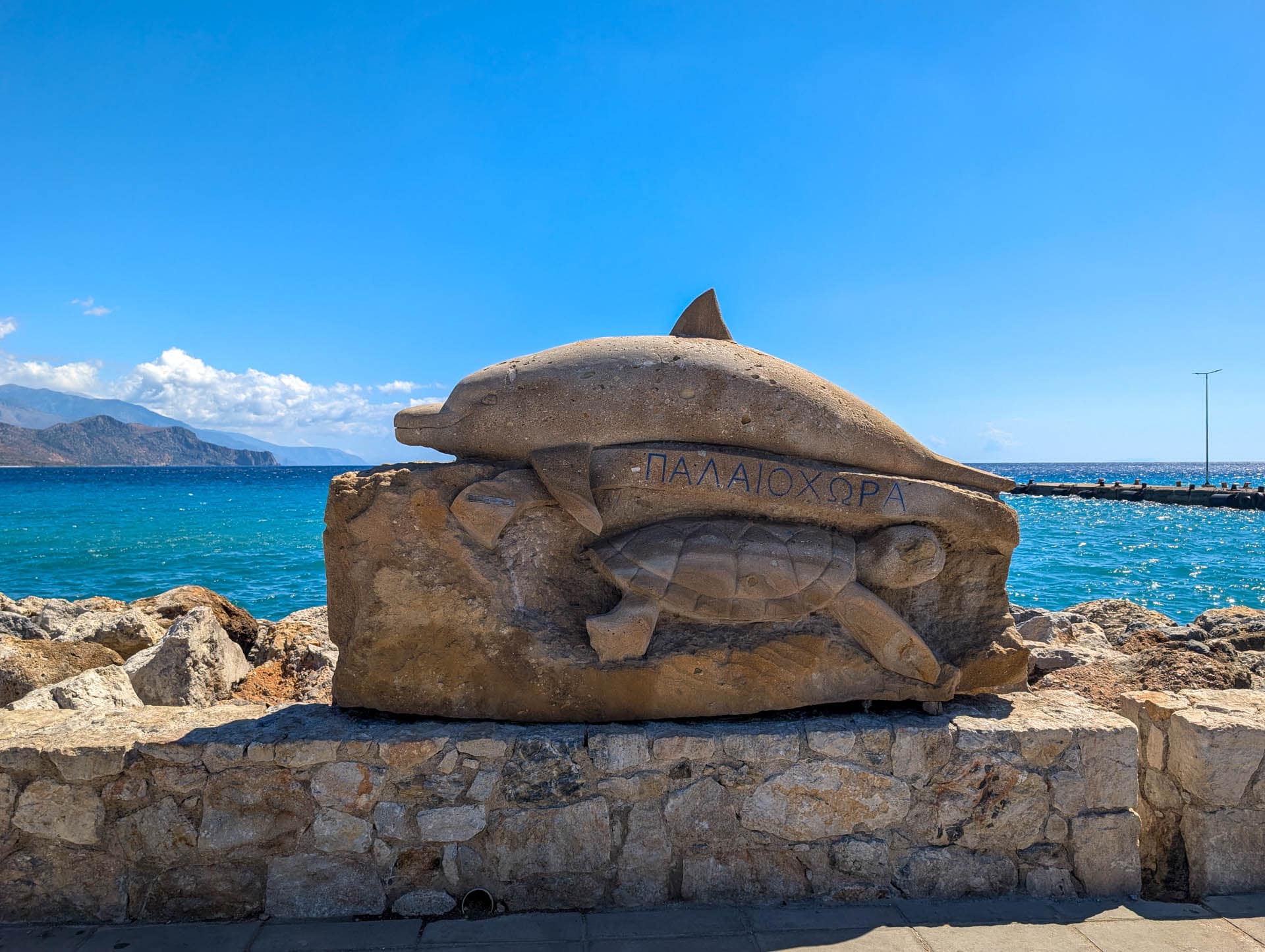 dolphin and turtle statue