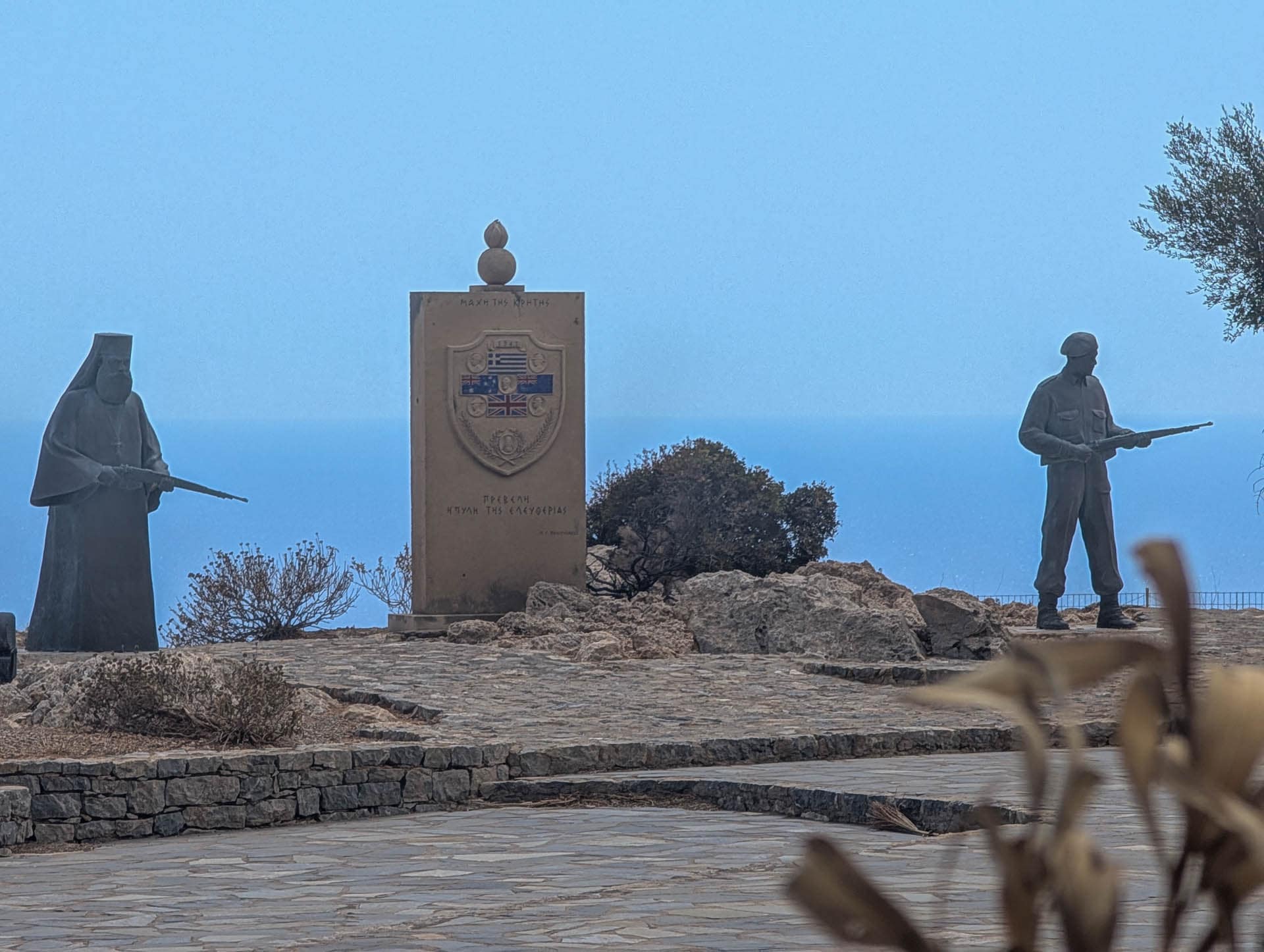 armed statues close up